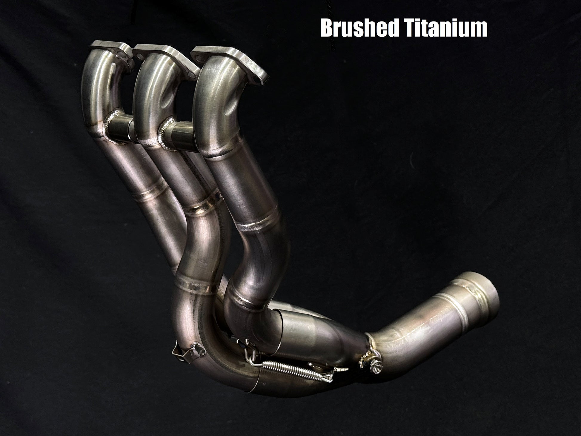 Close up image of a Brushed Titanium Headers.