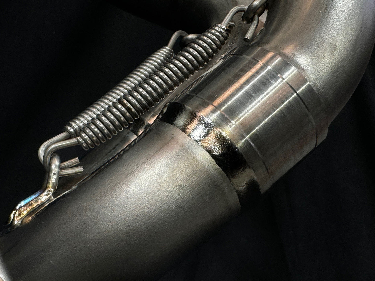 Two exhausts spring.