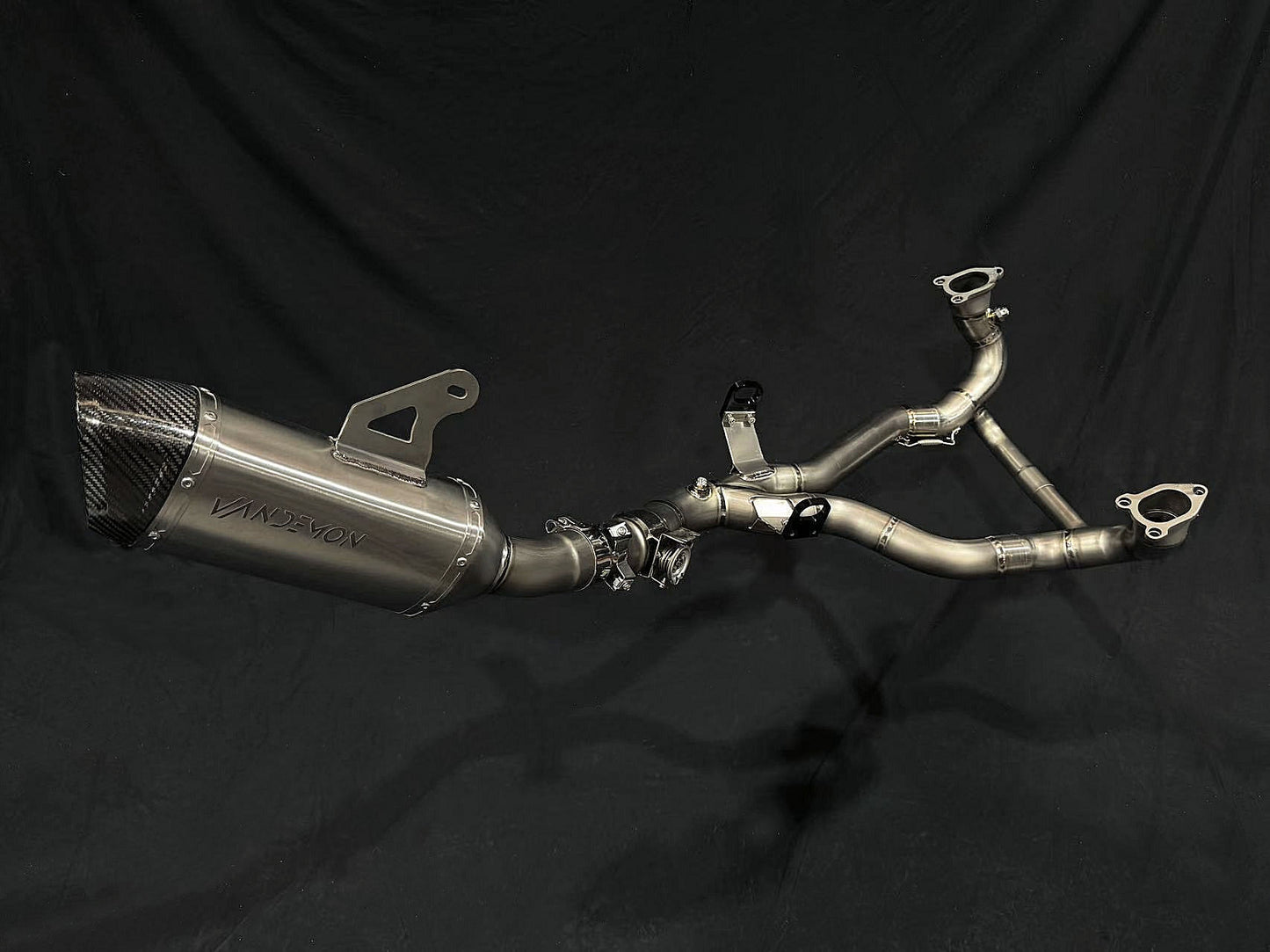 A Titanium Vandemon Exhaust Pipe in dual connector