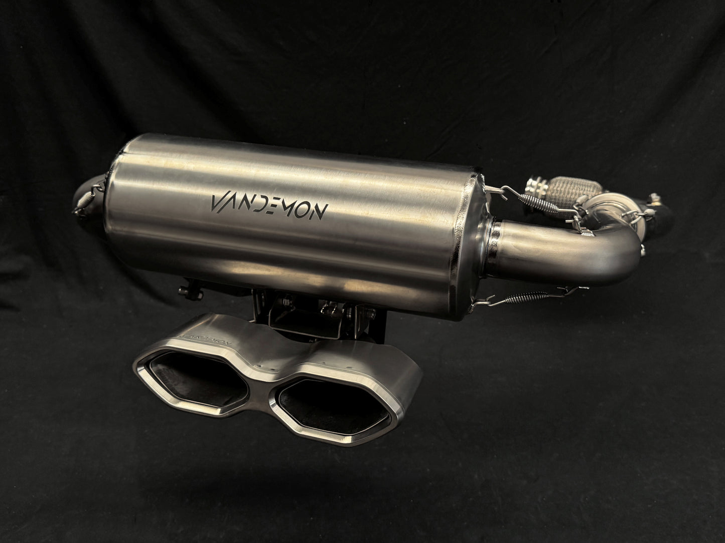 Close-up of modern dual-exhaust system on motorcycle.