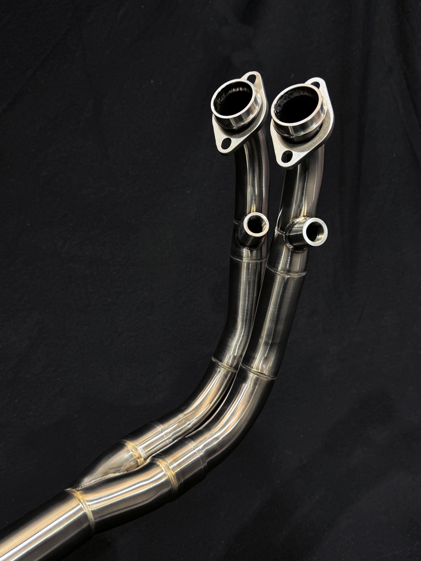 close up view of motorcycle exhausts.