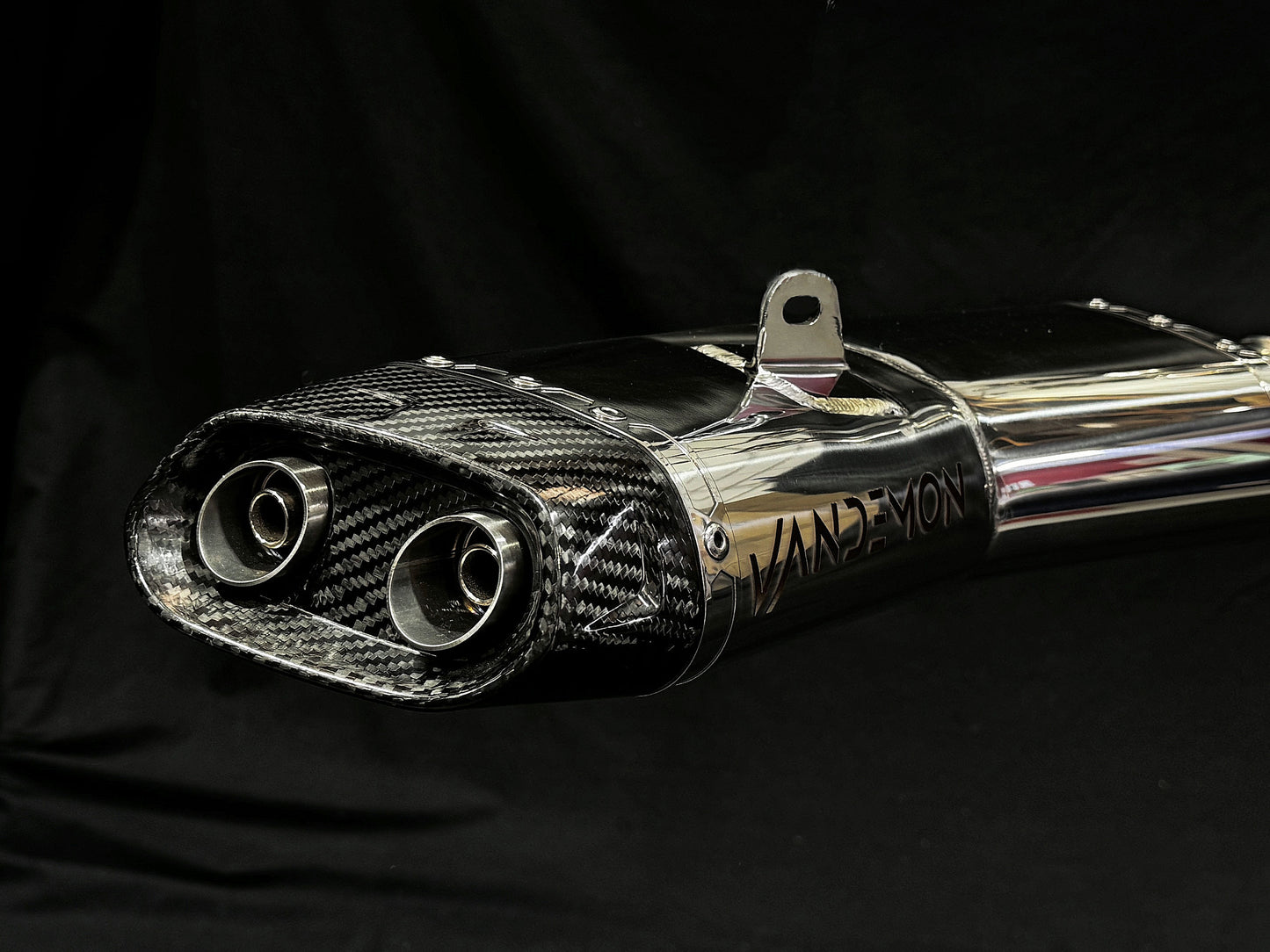 Close-up view of a carbon fiber exhaust pipe