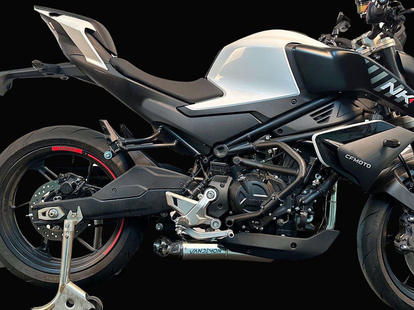 A motorcycle featured on a black backdrop