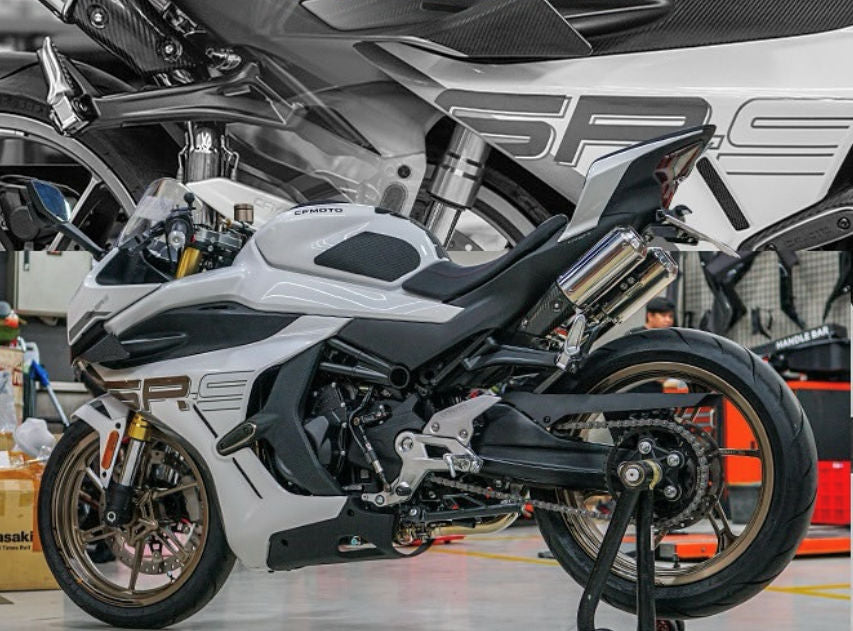 warehouse setting featuring motorcycles on display