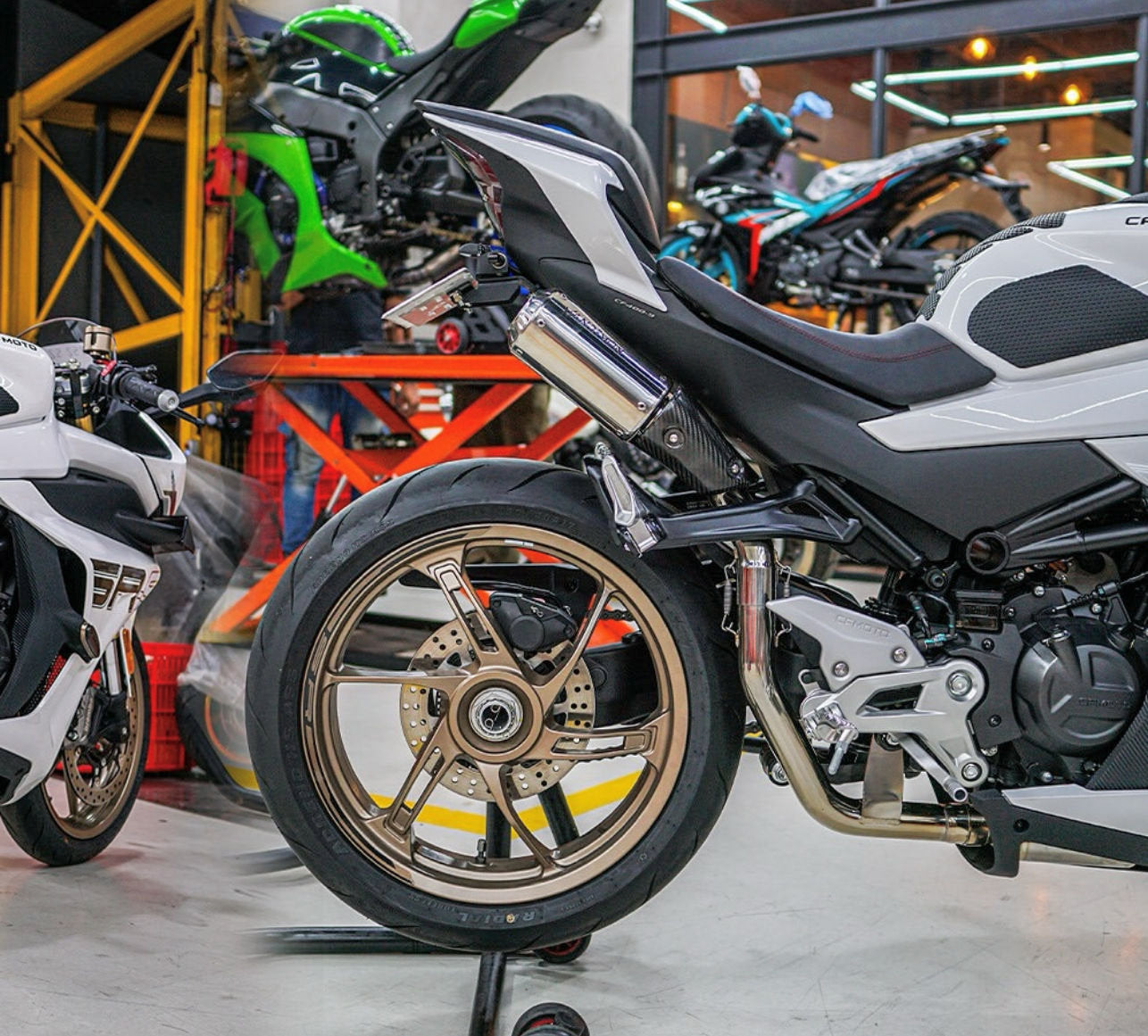 motorcycles showcased in a spacious warehouse