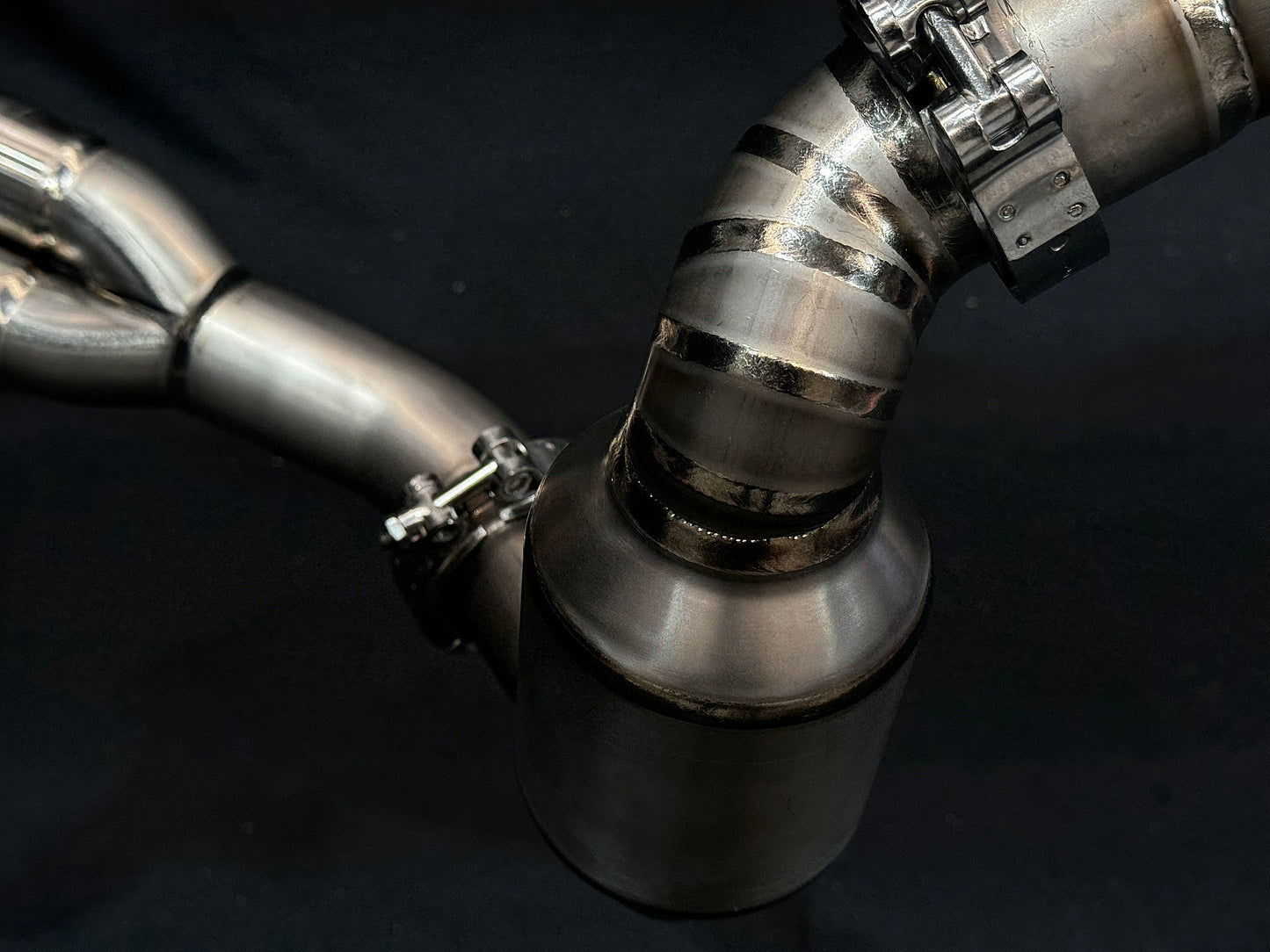 Close-up view of a shiny stainless steel pipe