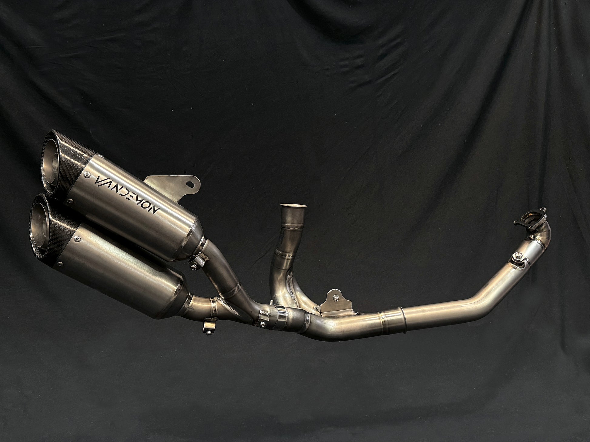 Close-up of modern dual-exhaust system on motorcycle.