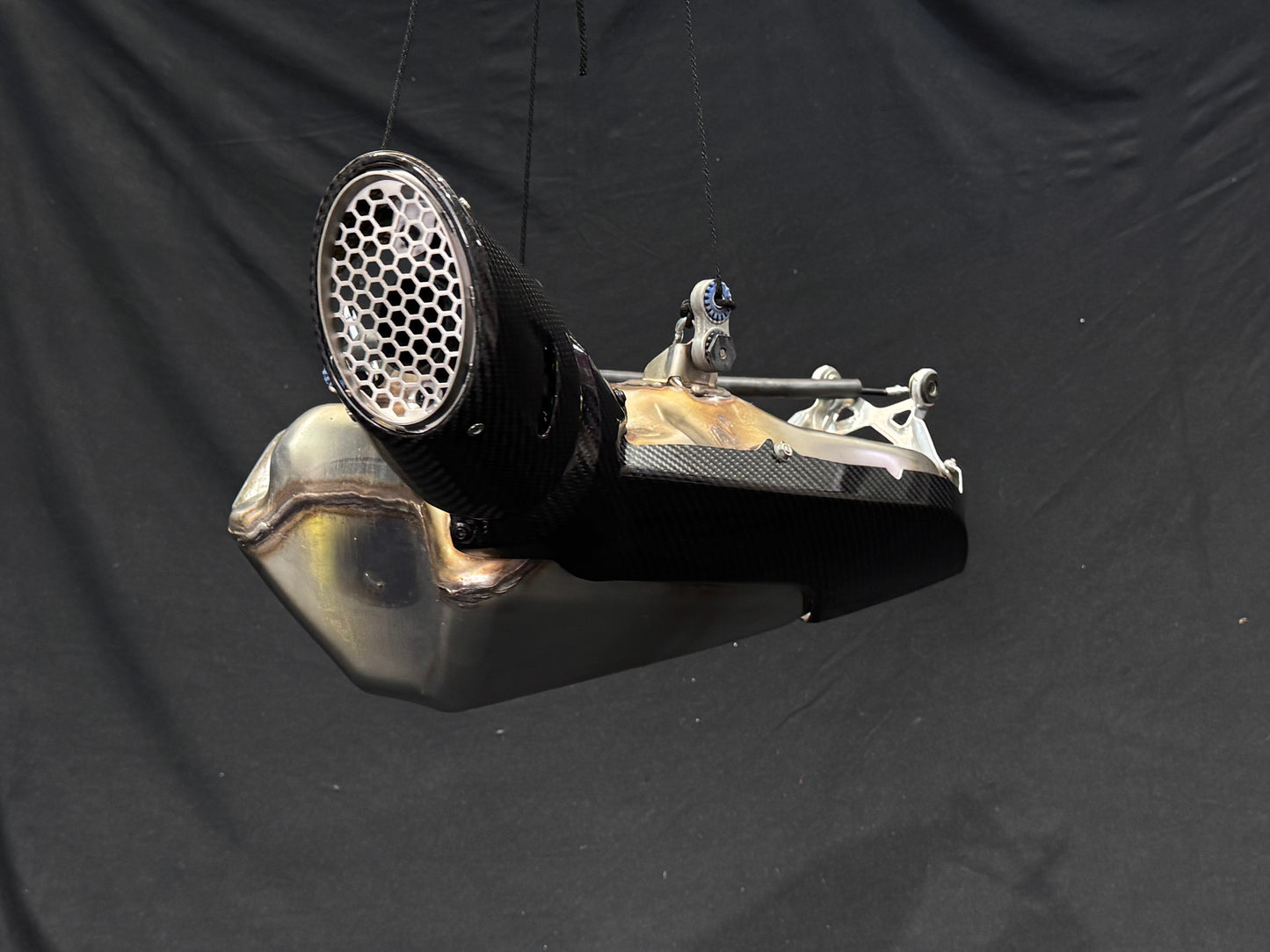 Vandemon exhaust on a black background