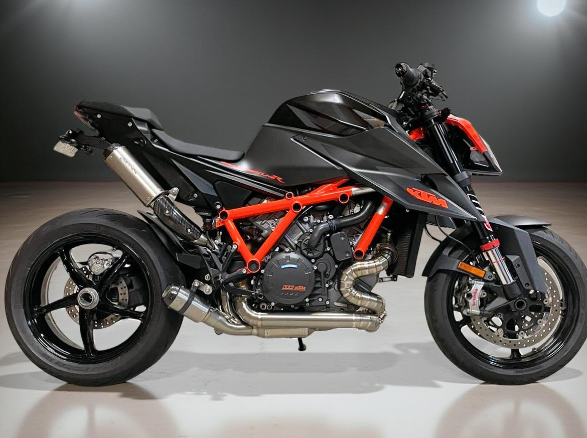 Black and red motorcycle on a dark background