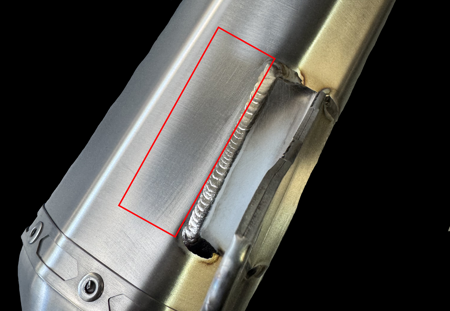Detailed close-up of a motorcycle exhaust pipe