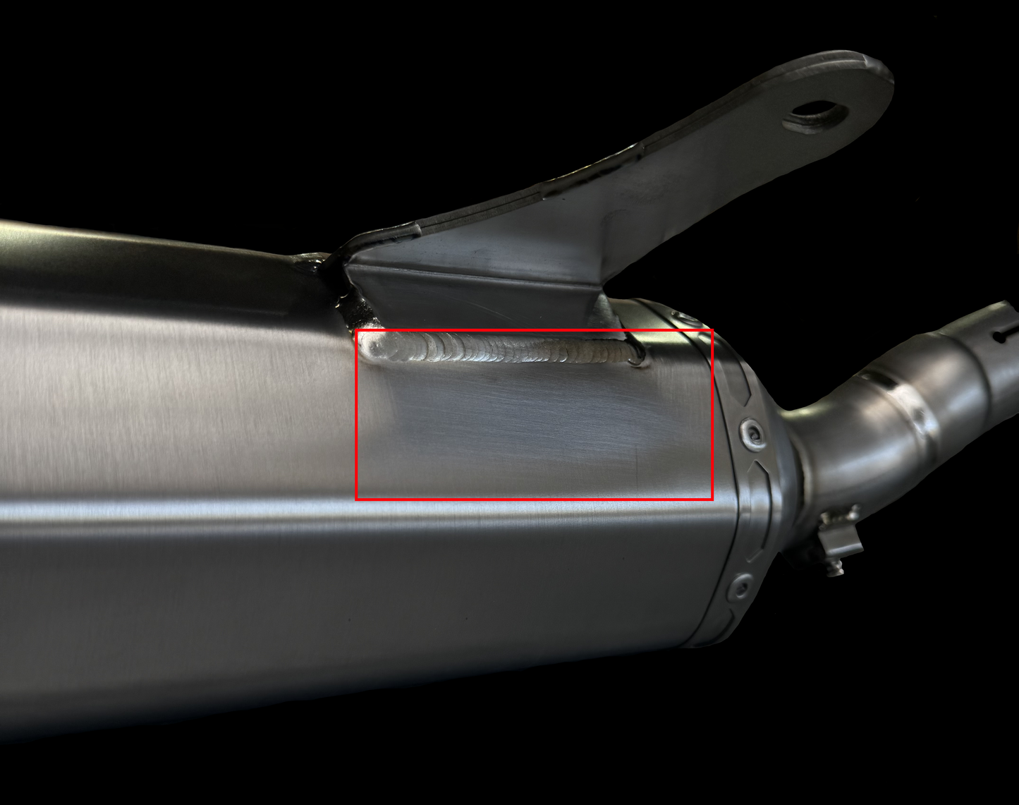 Close-up image of a motorcycle exhaust pipe