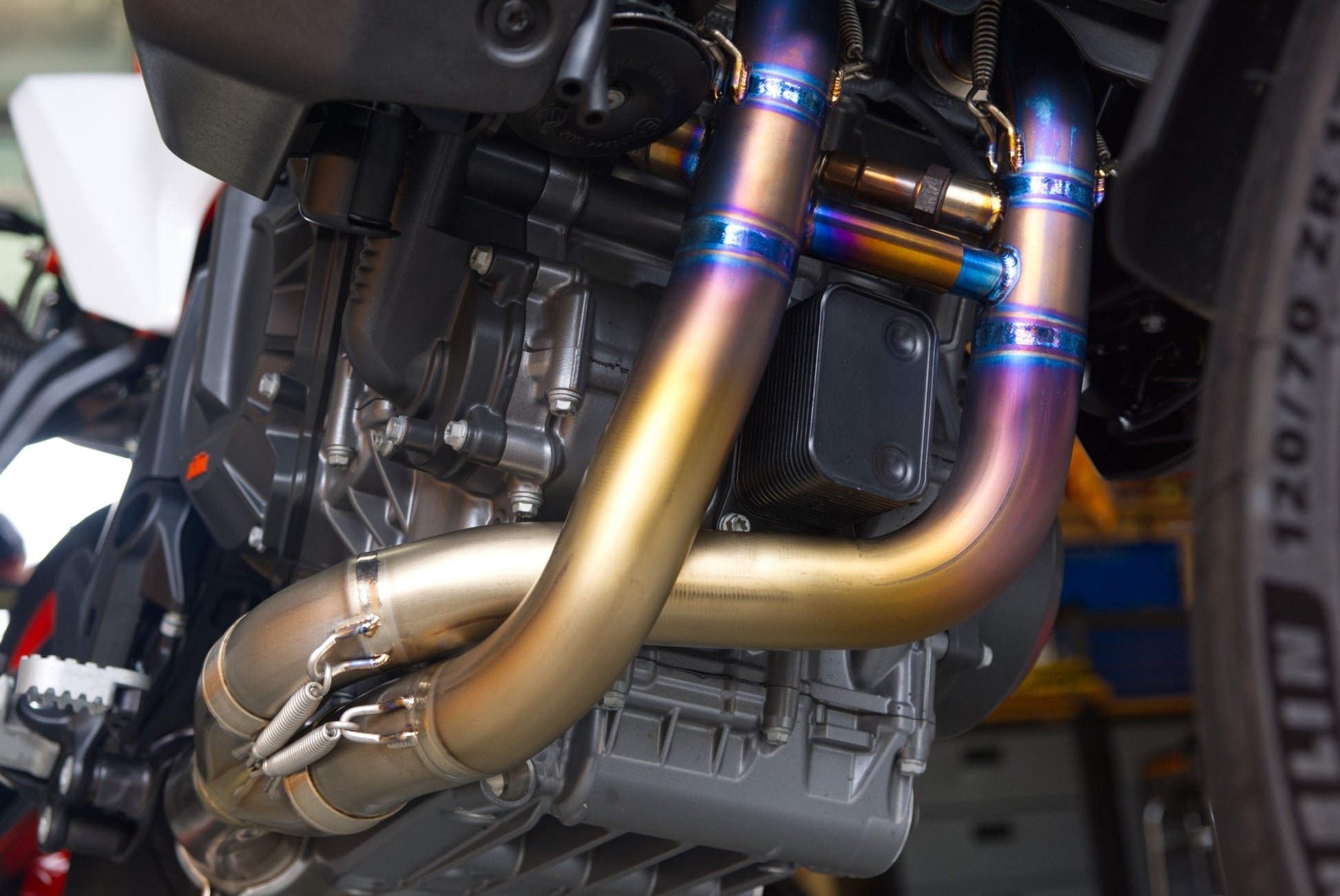 Detailed close-up of a motorcycle exhaust pipe