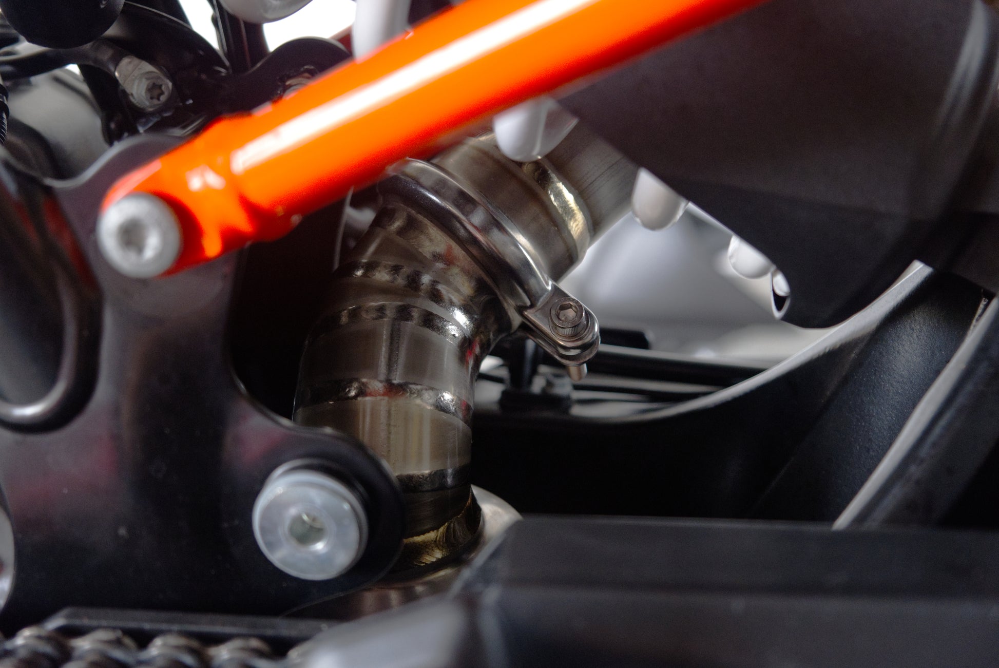 Detailed close-up of a motorcycle exhaust pipe
