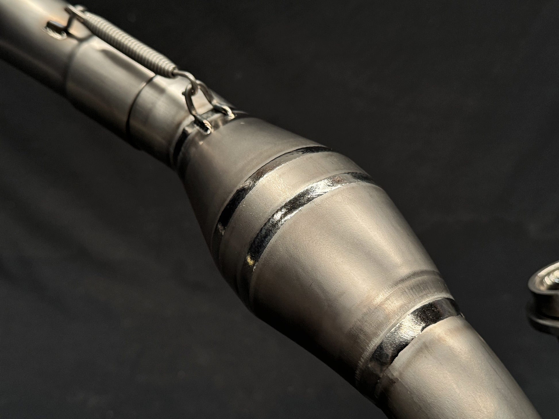 A Close up image of a Kawasaki KX250 Mid-Pipe Bomb.