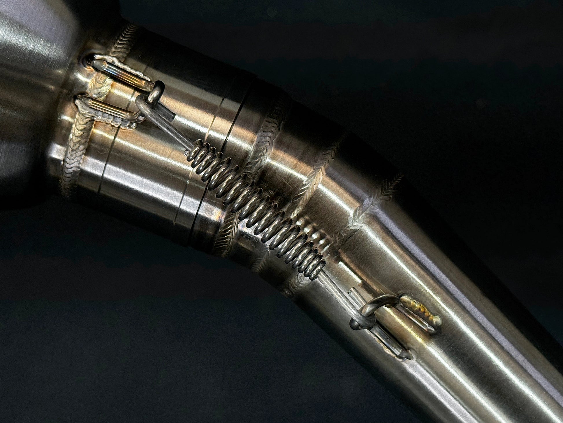 A motorcycle exhausts spring.