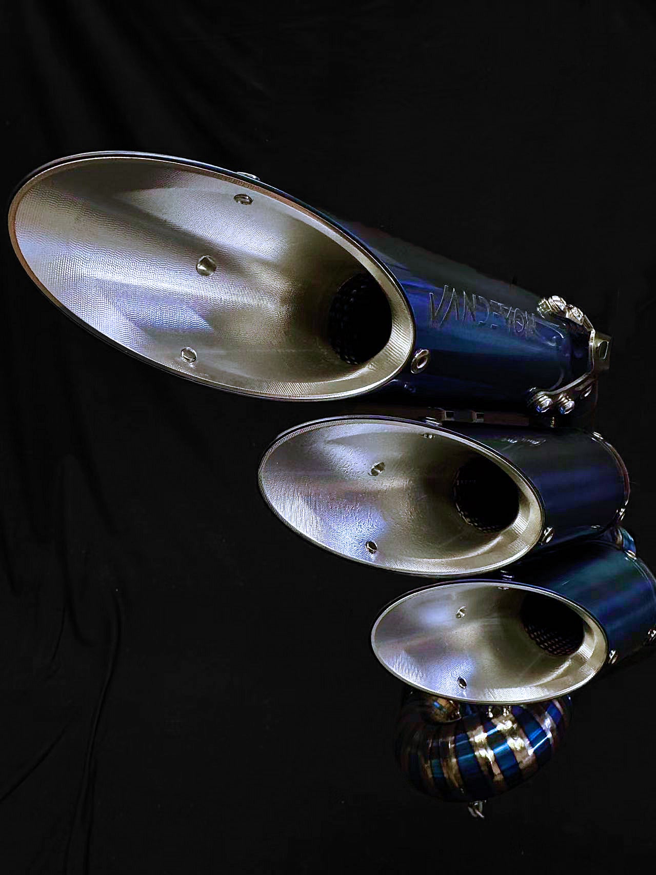 A Close up view of the exhausts tail pipe.