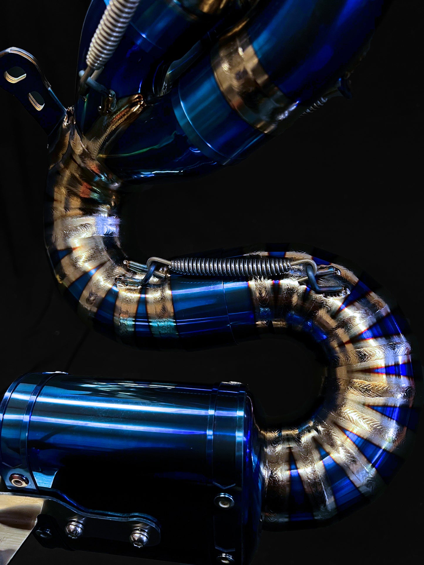 a blue titanium slip on exhausts