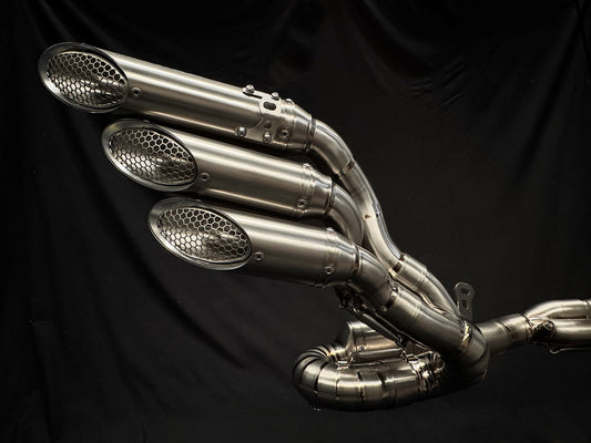MV Agusta F3 800 Brushed Titanium Exhaust Tips DB Killers fitted in a black backdrop.