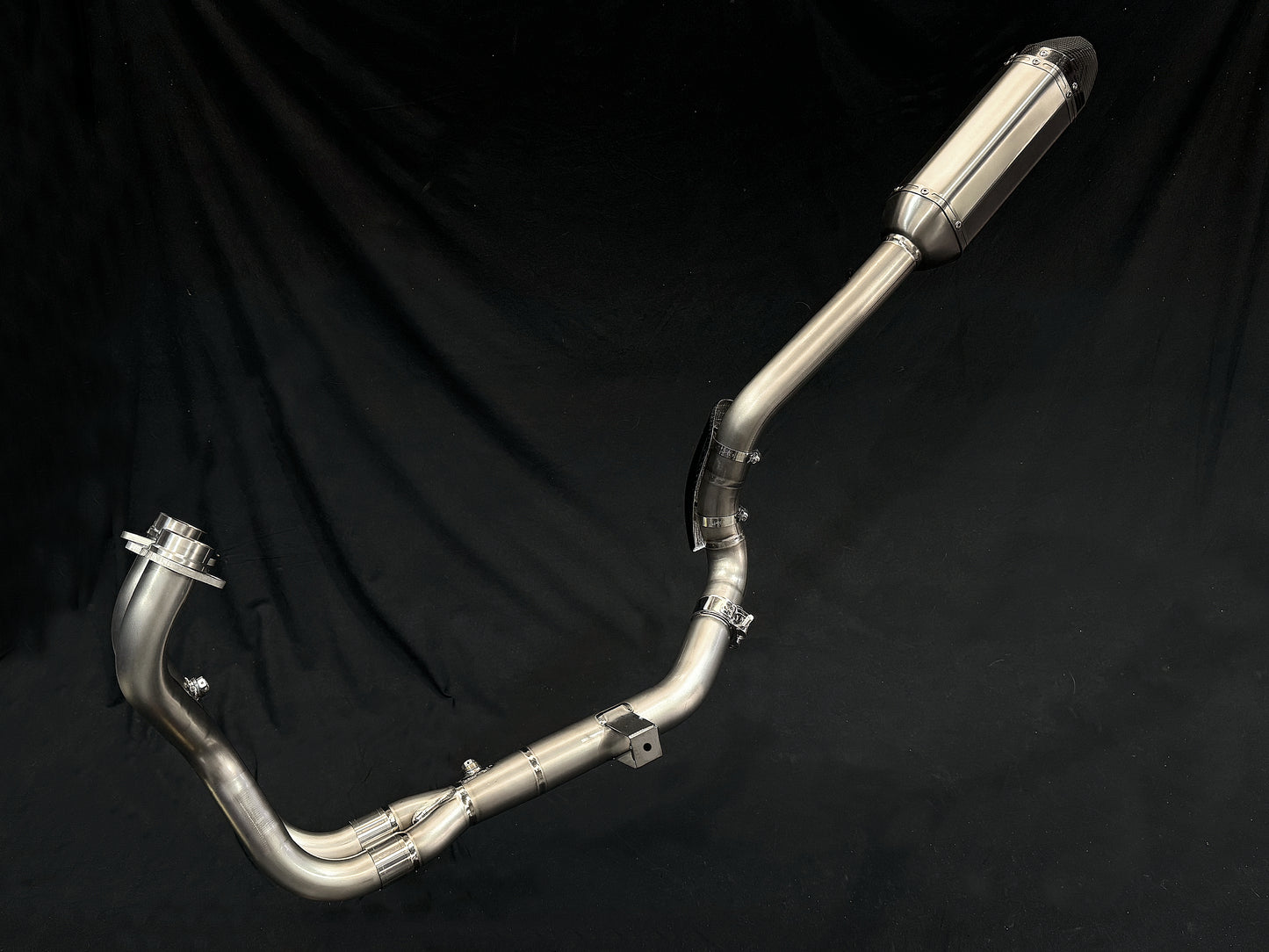 Yamaha Tenere700 Titanium Exhaust Cover fitted in a black backdrop.