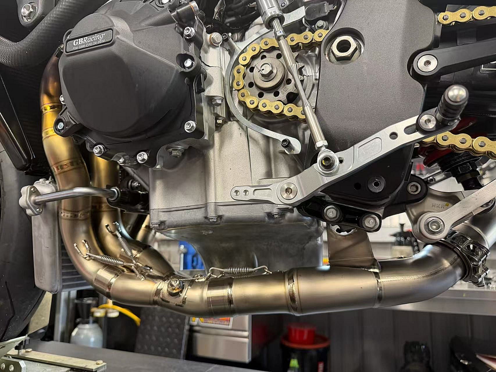 Close-up of a motorcycle engine with visible branding