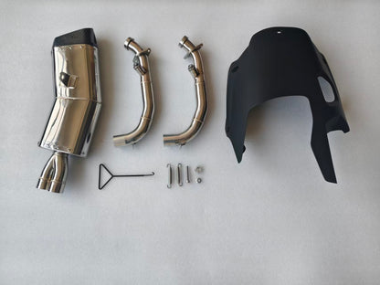 Motorcycle exhaust components and parts on a white background