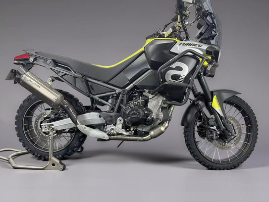 Motorcycle on a stand against a grey background
