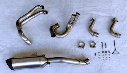 Motorcycle exhaust components on a white background