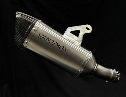 A Close up image of a BMW R1300GS Adventure Titanium Muffler.