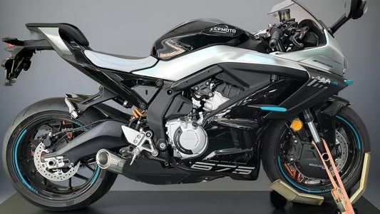 Black and silver CFMOTO 675RR motorcycle on a grey background