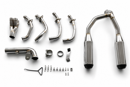 A stainless steel exhaust pipe kit with multiple curved and straight metal pipes, clamps, hose, and mounting hardware, arranged on a clean white background.