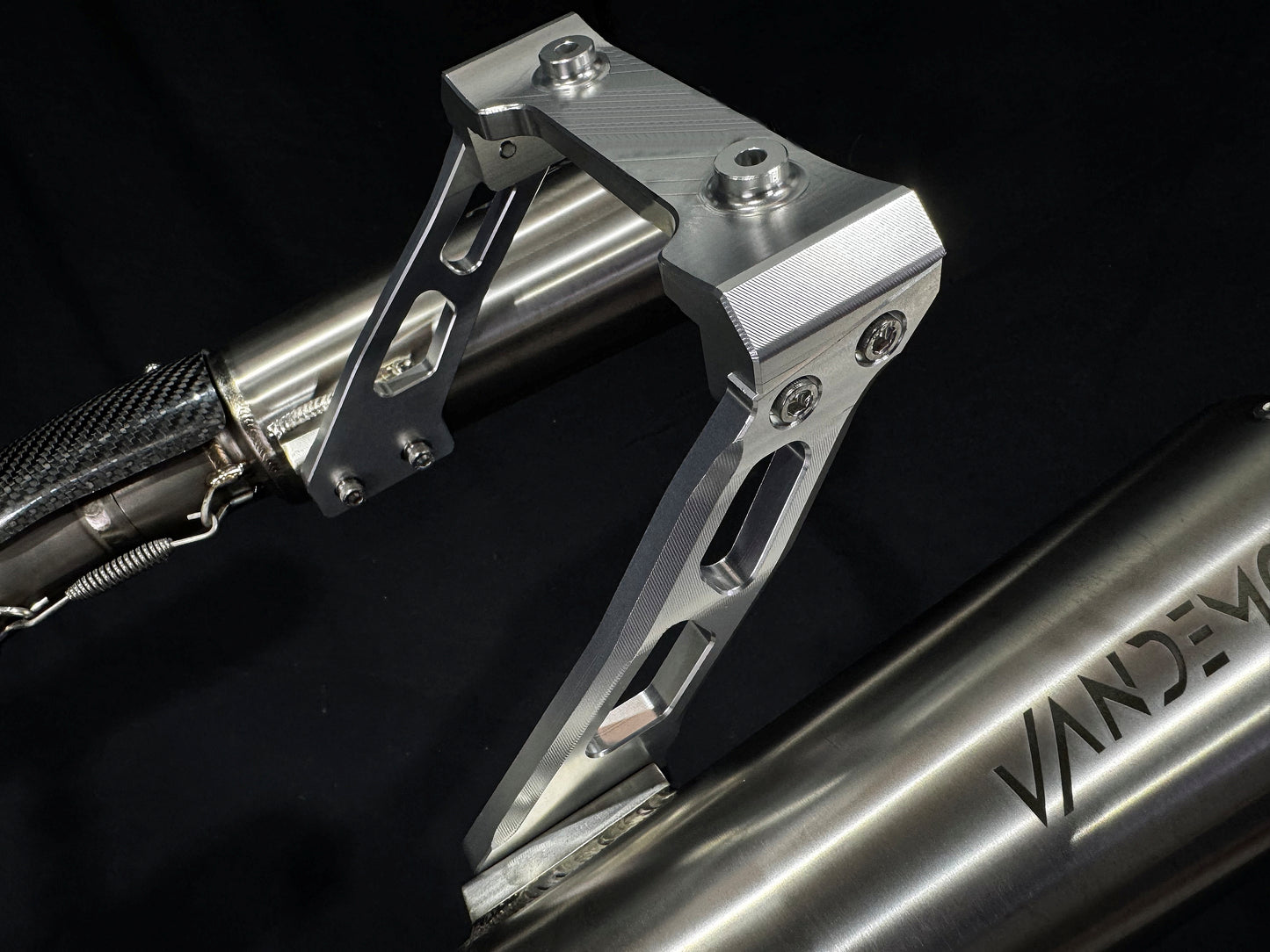 Titanium exhausts CNC muffler hanger.