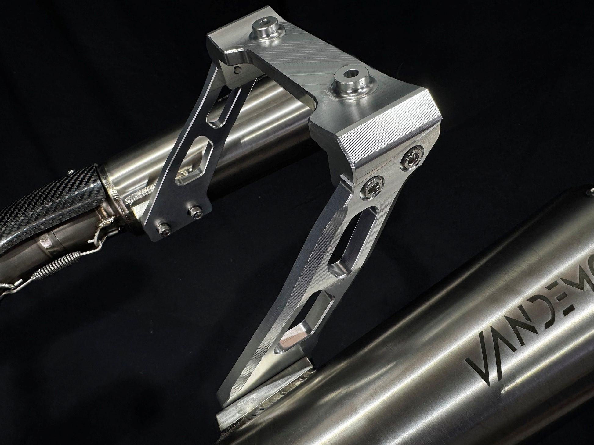 Titanium exhausts CNC muffler hanger.