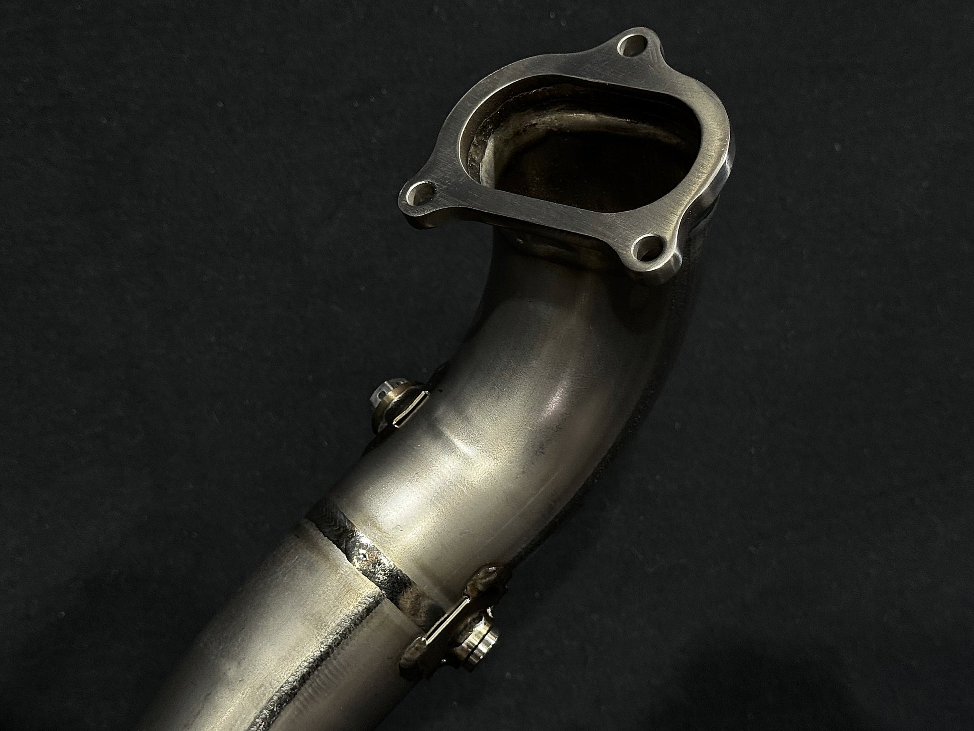 A supersport high mount titanium front spigot.