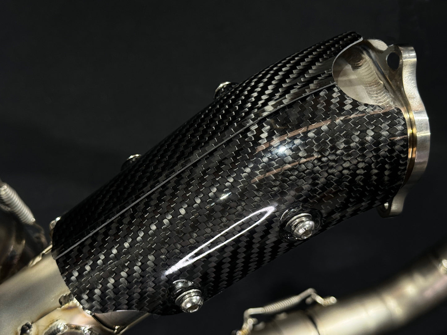 A detailed view of a motorcycle's rear spigot.