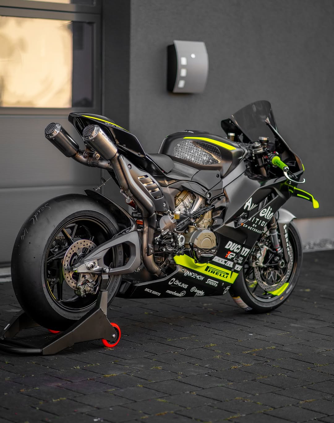 Motorcycle with visible branding on a dark pavement