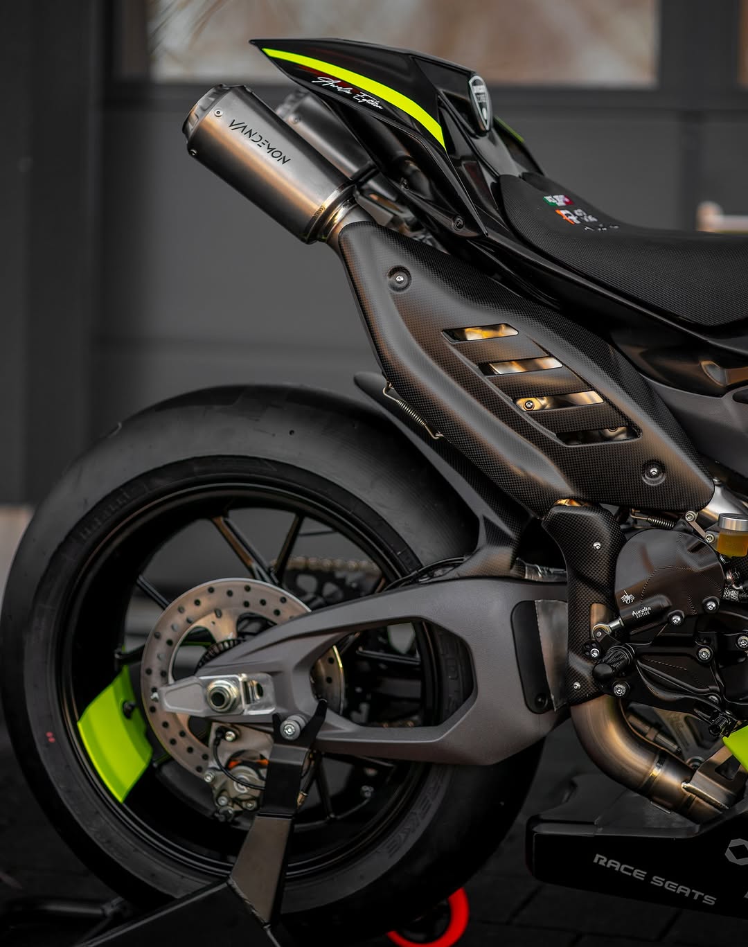 Close-up of a motorcycle with visible branding and design details.