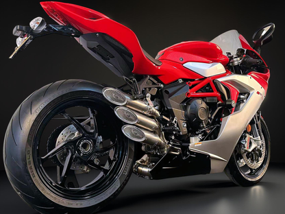 Red and black motorcycle on a dark background