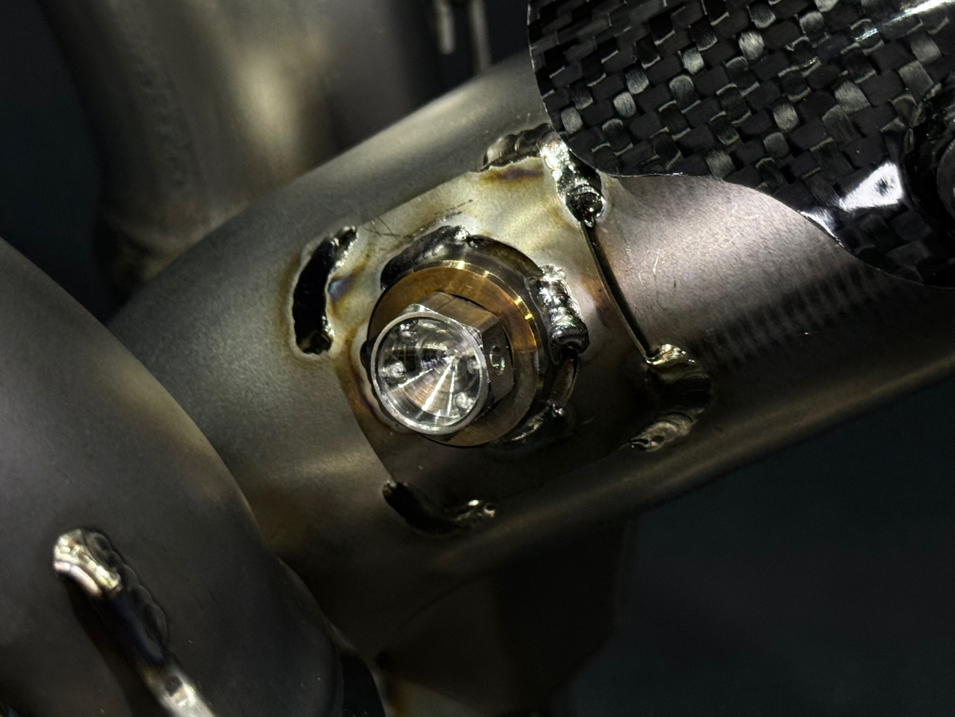 A close up view of a motorcycle's bolt.