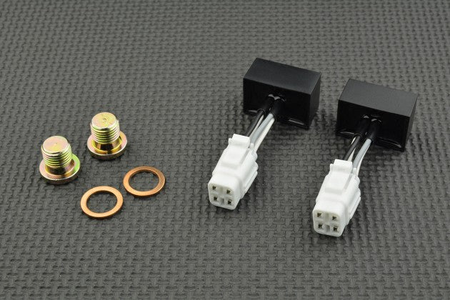 Mechanical components including connectors and washers on a grey textured background