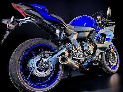 Blue and black Yamaha motorcycle on a dark background