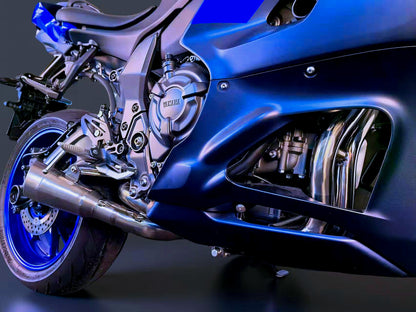 Close-up of a blue Yamaha motorcycle with visible branding on a dark background