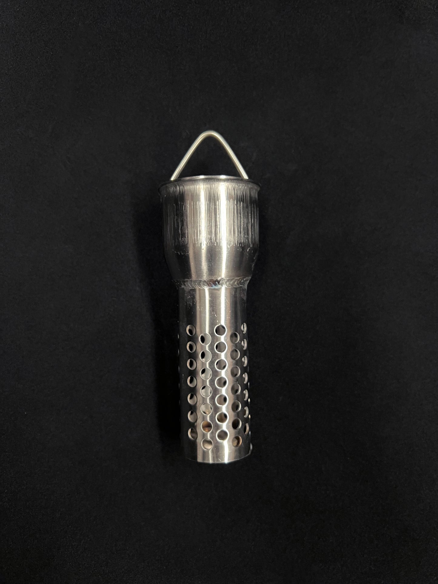 Metal object on a black background