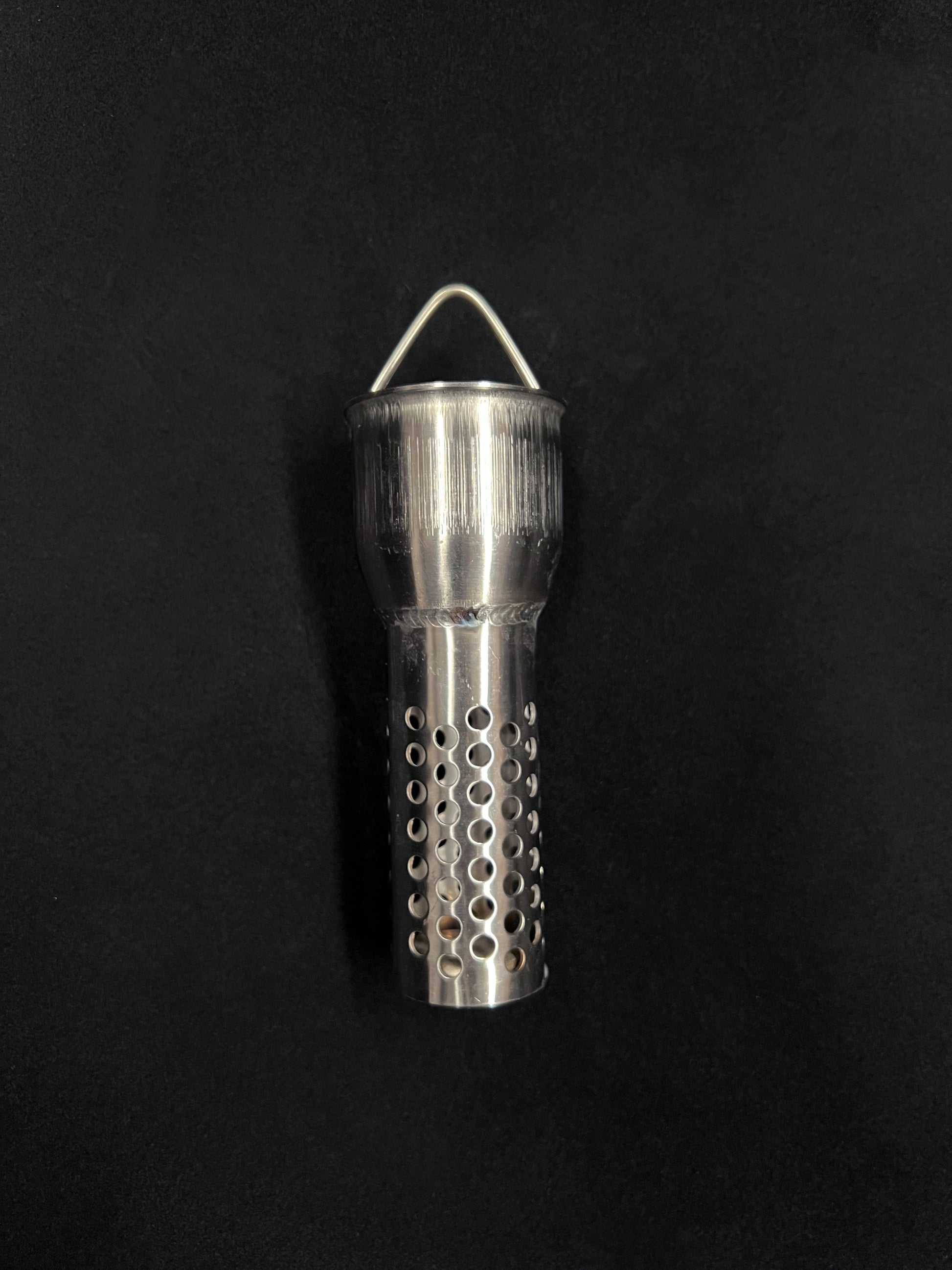 Metal object on a black background