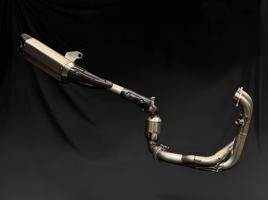 Metallic Vandemon exhaust pipe on a black background