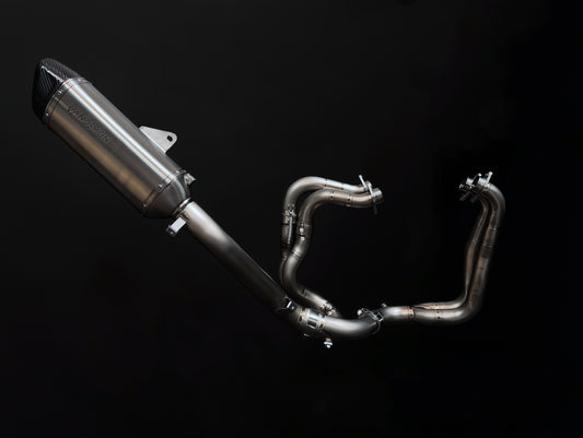 Metallic Vandemon exhaust system on a black background