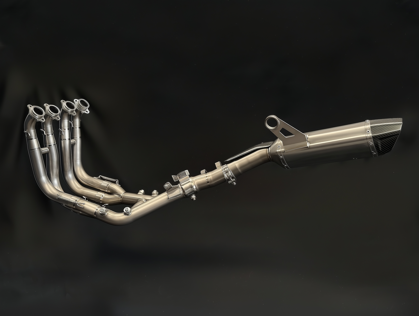 Motorcycle exhaust pipe on a black background