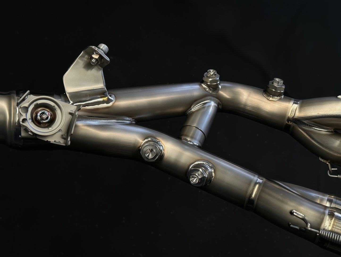 Close-up of a metallic mechanical component on a black background