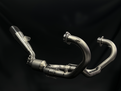 Metal exhaust pipes on a black background